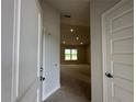 Inviting living room showcasing recessed lighting, a neutral color palette, and an open floor plan at 120 Dogwood Drive Cir, Ocala, FL 34472