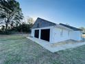 Spacious two-car garage, offers ample parking and storage with shingled gable ends at 15040 Sw 29Th St, Ocala, FL 34481