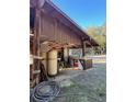 Outbuilding features a sink and some storage at 9205 Sw 152Nd Pl, Dunnellon, FL 34432