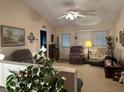 Spacious living area with neutral colors, offering a bright and open space for relaxation at 9638 Sw 94Th Ct # A, Ocala, FL 34481