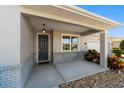 Charming front entrance featuring a covered porch at 9704 Sw 95Th Loop, Ocala, FL 34481