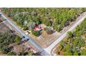 Aerial view of home and surrounding property at 23761 Sw Plaza Ct, Dunnellon, FL 34431