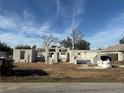 Construction site featuring the concrete block frame of a single-story house at 9361 Se 162Nd Pl, Summerfield, FL 34491