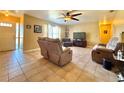 Cozy living room with tile floors and a large window with lots of natural light at 13718 Sw 40Th Cir, Ocala, FL 34473