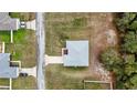 Home's roof stands out in this aerial view, complemented by its well-kept surroundings at 1482 Ne 160Th Pl, Citra, FL 32113