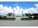 Beautiful water fountain feature surrounded by lush greenery in a picturesque setting at 13340 Se 86Th Cir, Summerfield, FL 34491