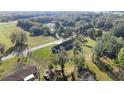 Overhead view of the home and surrounding tree coverage at 7010 Nw 44Th Ave, Ocala, FL 34482