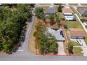 Aerial view of property highlighting the home's location on a tree-lined street at 18 Fir Trail Pass, Ocala, FL 34472