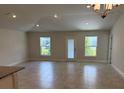 Bright and airy living room with tile flooring and ample natural light at 2150 Nw 23Rd Loop, Ocala, FL 34475