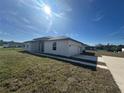 Charming single-story home with well-manicured lawn, garage, and long drive way at 4524 Sw 110Th St, Ocala, FL 34476