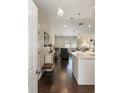Bright living room featuring an open floor plan and hardwood floors at 9504 Sw 97Th Ln # B, Ocala, FL 34481