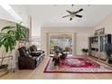 Spacious living room featuring comfortable seating and bright natural light at 5040 Nw 35Th St, Ocala, FL 34482