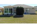 Nice sunroom with a large backyard perfect for outdoor activities at 13100 Se 93Rd Terrace Rd, Summerfield, FL 34491