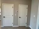 Hallway featuring access to storage space and mechanical systems at 2728 Sw 154Th Place Rd, Ocala, FL 34473