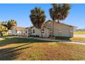 Charming home with lush landscaping, arched entryways, and inviting curb appeal at 8947 Se 70Th Ter, Ocala, FL 34472