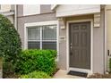 Close up of front door with decorative landscaping and house number at 4491 Sw 49Th Ave, Ocala, FL 34474