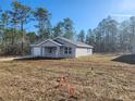 Charming single-story home featuring a classic design with a well-maintained front yard at 107 Sw Alvarez Rd, Dunnellon, FL 34431