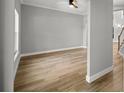 A modern living room featuring wood floors and white trim at 1628 Se 29Th Ter, Ocala, FL 34471