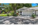 Charming single-story home featuring a wide driveway and lovely landscaping at 8430 Sw 90Th Ln # A, Ocala, FL 34481