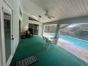 Enjoy the poolside lanai for relaxation and shade near the pool at 19726 Sw 95Th St, Dunnellon, FL 34432