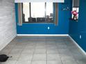 Bright dining room with modern tile flooring and large window at 409 Marion Oaks Dr, Ocala, FL 34473