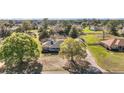 Beautiful house with a large yard and mature trees at 5926 Ne 62Nd Court Rd, Silver Springs, FL 34488