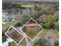 An aerial view of the homesite showing the roof, surroundings, and neighborhood at 1300 Ne 53Rd St, Ocala, FL 34479