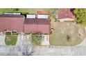 Aerial view of the villa showcasing the roof, parking, and well-maintained community at 3447 Sw 19Th Pl, Ocala, FL 34474