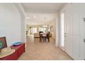 Bright and airy tiled foyer with views of the dining area and living spaces at 7092 Sw 93Rd Ave # 1, Ocala, FL 34481
