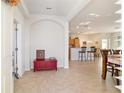 Open foyer showcasing archways, neutral colors, and tiled flooring at 7092 Sw 93Rd Ave # 1, Ocala, FL 34481