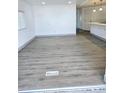 Open-concept living room with recessed lighting and wood-look floors at 5860 Sw 64Th Street Rd, Ocala, FL 34474