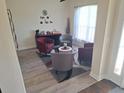 Cozy living room area features a coffee and tea bar, comfortable seating, and natural light at 3819 Se 99Th St, Belleview, FL 34420