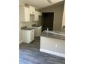 Bright kitchen featuring stylish cabinets, gray counter tops and new stainless steel appliances at 734 Nw 57Th Ave, Ocala, FL 34482