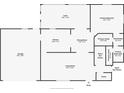 Open floor plan featuring a spacious kitchen, dining room, living room, lanai, and main bedroom at 9886 Se 178Th Ln, Summerfield, FL 34491