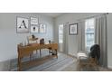 Bright home office space with a wooden desk, stylish decor, and natural lighting at 4236 Sw 53Rd Lane Rd, Ocala, FL 34474