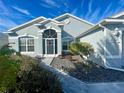 Charming single-story home features a well-maintained front yard and decorative architectural details at 15702 Sw 16Th Avenue Rd, Ocala, FL 34473