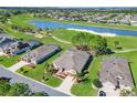 Expansive aerial view of property showcasing lush landscaping and scenic golf course surroundings at 7527 Sw 97Th Terrace Rd, Ocala, FL 34481