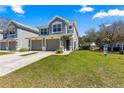 Beautiful two-story home with a well-maintained lawn and double garage at 4401 Sw 52Nd Cir # 110, Ocala, FL 34474