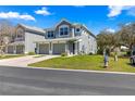 Two-story home in a residential area with a well-kept lawn and attached garage at 4401 Sw 52Nd Cir # 110, Ocala, FL 34474