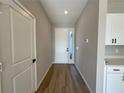 Inviting entryway with wood floors and a view of the front door at 9975 Sw 39Th Ter, Ocala, FL 34476