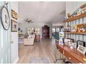 Spacious home entryway featuring wood floors and open living spaces at 2380 Nw 55Th Avenue Rd, Ocala, FL 34482