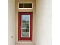 Elegant front door with decorative glass insert, adding a touch of sophistication to the home's entrance at 4504 Sw 90Th Lane Rd, Ocala, FL 34476