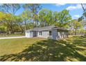 Well maintained single story home with lush green lawn at 4585 Se 136Th St, Summerfield, FL 34491