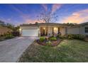 Inviting single-story home boasting well-manicured landscaping and a brick paver driveway at 8344 Sw 79Th Cir, Ocala, FL 34476
