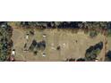 Birds eye view of the acreage with paddocks, sheds and other outbuildings at 10750 Nw 7Th St, Ocala, FL 34482