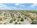 An aerial shot of a residential area, revealing the orderly layout and landscaping of the community at 13805 Se 87Th Ter, Summerfield, FL 34491