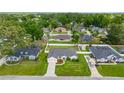 Aerial view of a home in a well-developed neighborhood, boasting lush greenery at 3203 Se 23 Ter, Ocala, FL 34471
