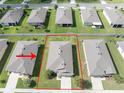 Aerial view showing the home's layout and property lines in a residential neighborhood at 6138 Sw 89Th Lane Rd, Ocala, FL 34476