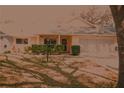 Inviting exterior of a home with a well-kept lawn and manicured shrubbery at 8569 Sw 92Nd Ln # B, Ocala, FL 34481