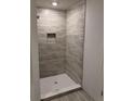 Modern bathroom showcasing tiled walk-in shower with stylish fixtures, offering a clean and functional space at 2218 Nw 23Rd Loop, Ocala, FL 34475